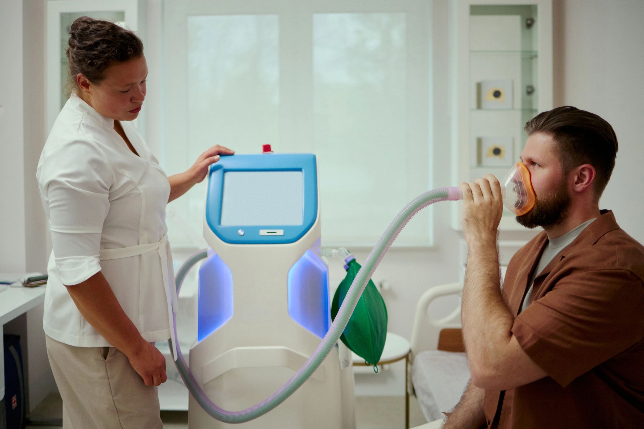 Patient using a respiratory therapy device during pulmonary rehabilitation